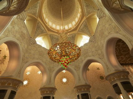 Low angle view of chandelier in ornate dome