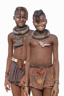 Black girls wearing traditional clothing and jewelry