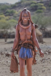 Black woman wearing traditional clothing and jewelry
