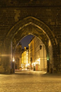Arches in stone wall outside city