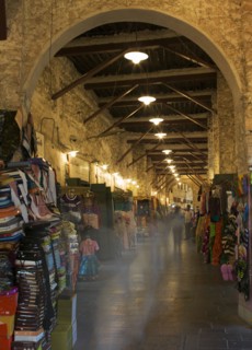 Blurred view of people shopping in indoor market