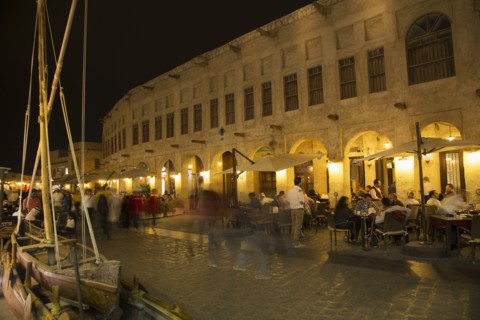 Blurred view of people shopping in outdoor market