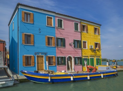 Gondolas parked in Venice Burano canal