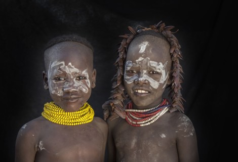 Black children with traditional face paint