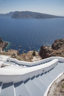 High angle view of hillside steps over ocean