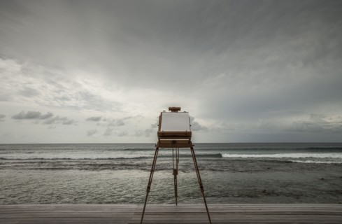 Vintage camera photographing seascape