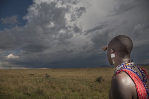 Black man in traditional clothing admiring view