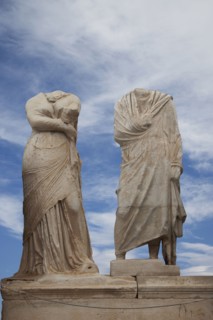 Low angle view of dilapidated statue ruins