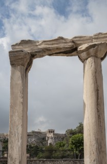 Ruin pillars and cloudy sky
