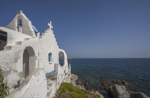 Traditional church on rocky oceanfront