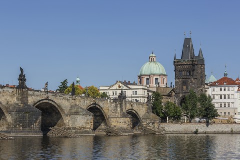 Buildings and bridge over Prague waterfront