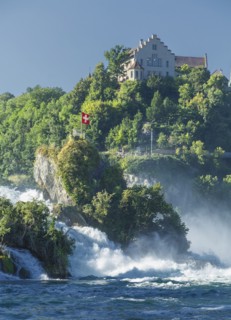 House on cliff overlooking river