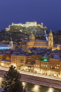 Aerial view of Salzburg cityscape illuminated at night
