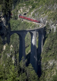 Train on mountain bridge