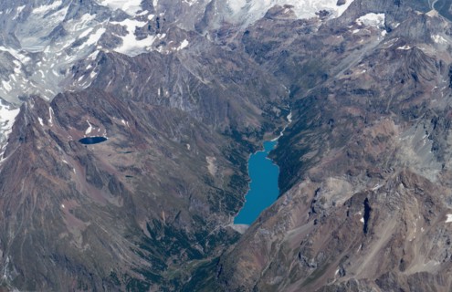 Aerial view of lakes in snowy mountain landscape