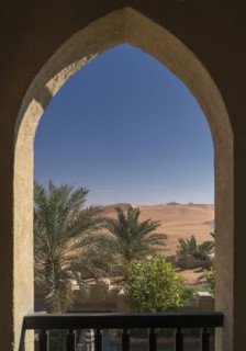 Scenic view of desert through arch