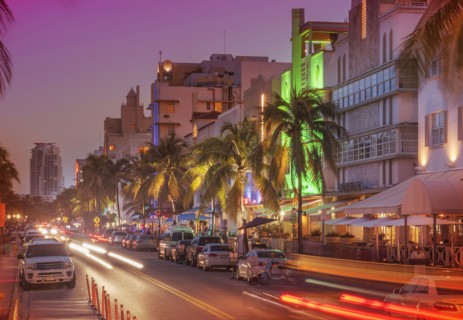 Cars driving in street at night