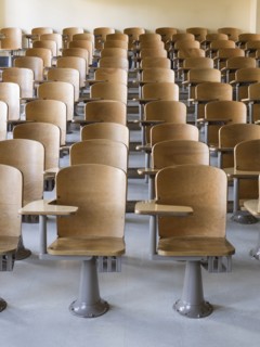 Rows of desks in classroom