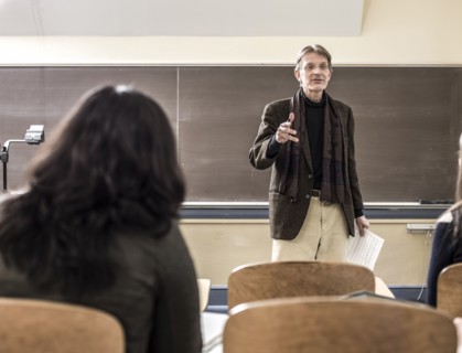 Teacher talking to students in classroom