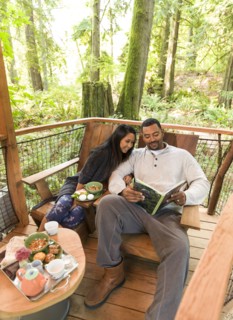 Couple relaxing together on deck