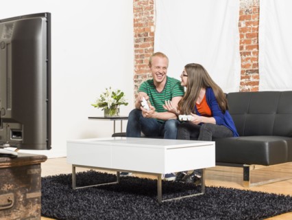 Couple playing video games together