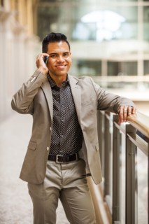 Hispanic businessman talking on cell phone