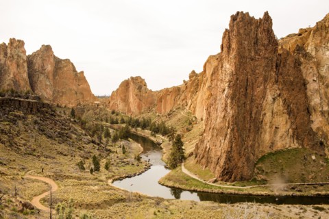 Stream through sheer cliffs in desert landscape