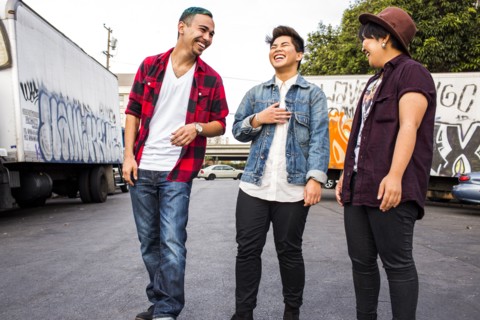 Friends laughing outdoors
