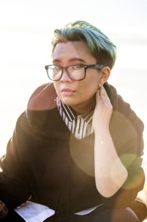 Portrait of serious androgynous Asian woman