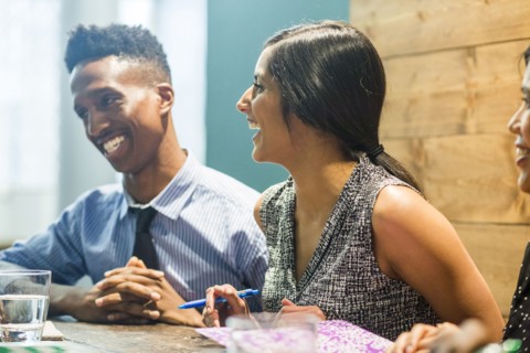 People laughing in meeting