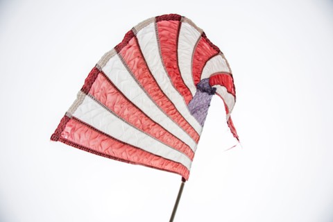 American flag blowing in wind