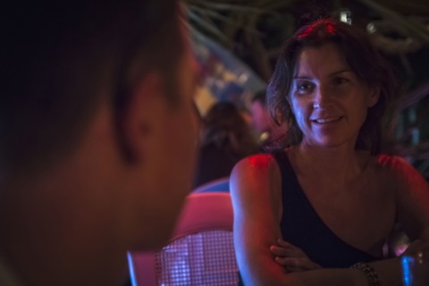 Caucasian couple talking in restaurant