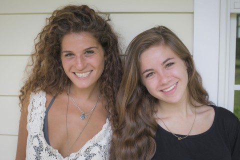 Caucasian teenage girls smiling outdoors