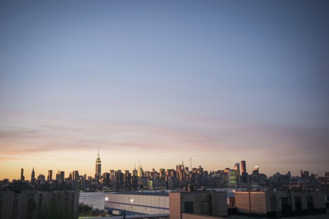 New York city skyline under sunset