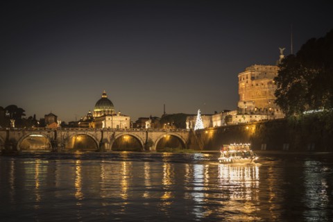Illuminated bridge over river