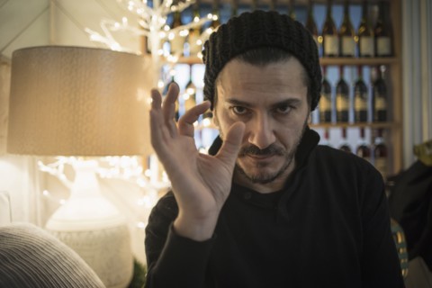 Caucasian man demonstrating size with fingers