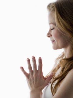 Close up of Caucasian woman meditating