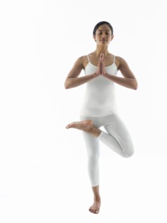 Serene woman practicing yoga