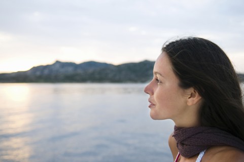 Close up of woman overlooking ocean