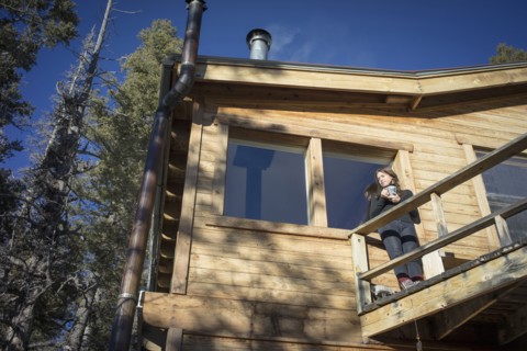 Caucasian woman standing on cabin deck