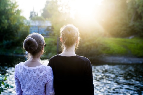 Caucasian women admiring river