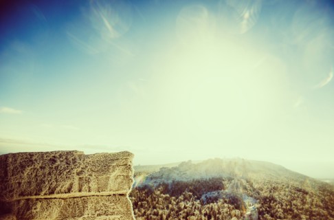 Mountaintops in remote landscape under sunny sky