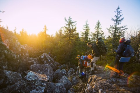 Caucasian hikers walking on remote mountainsides