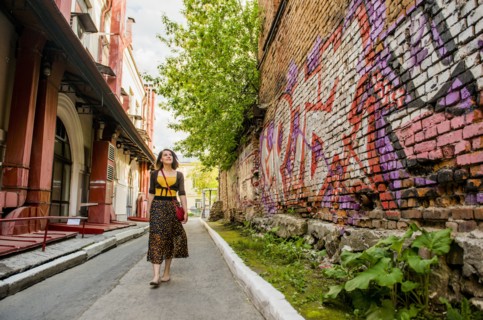 Caucasian woman walking in city street