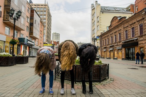 Caucasian women posing outdoors