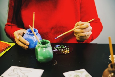 Close up of artist making miniature painting