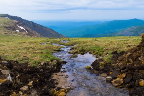 Creek flowing in mountains