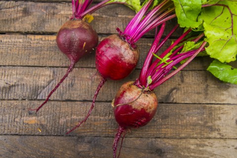 Fresh beets on wooden table