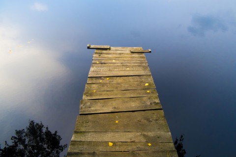 Dock over still lake