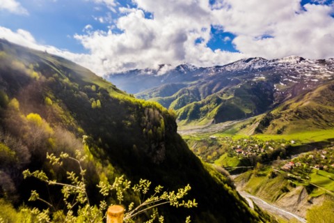 Clouds over village in valley